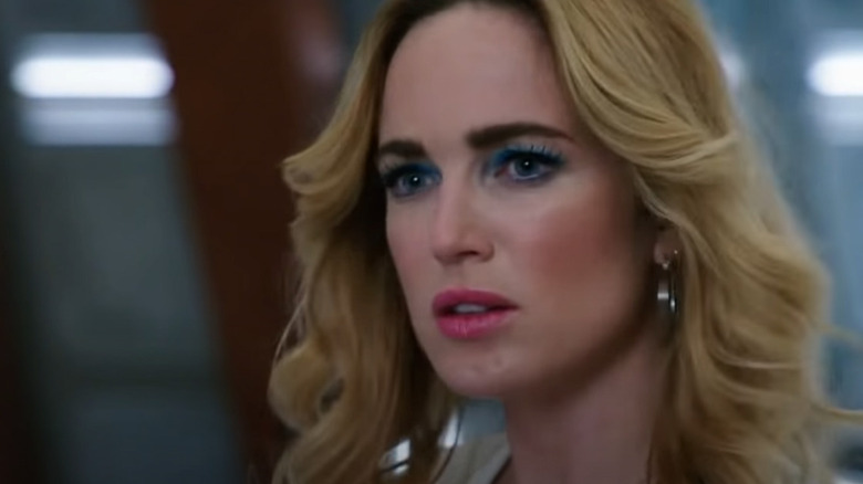 Caity Lotz looks left