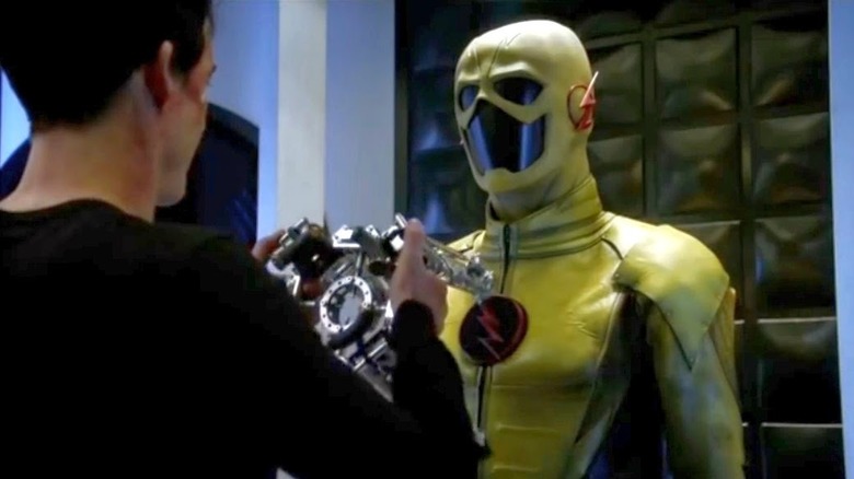 Harrison inspects yellow suit