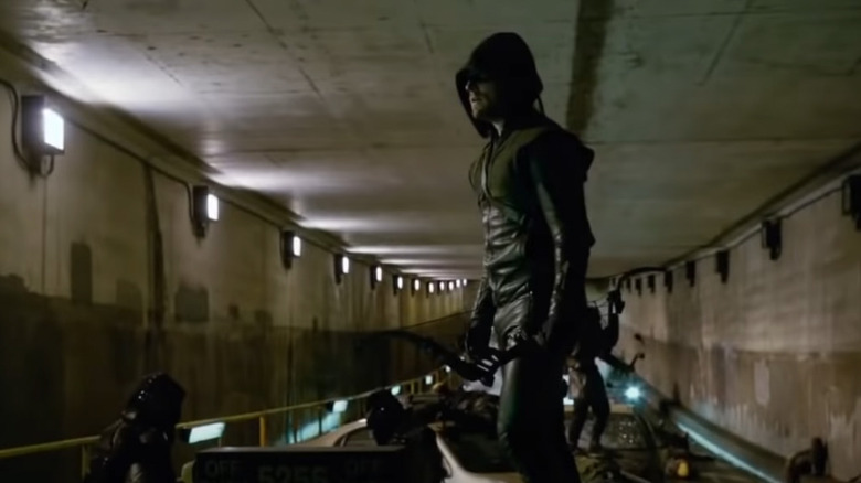 Arrow stands in a tunnel