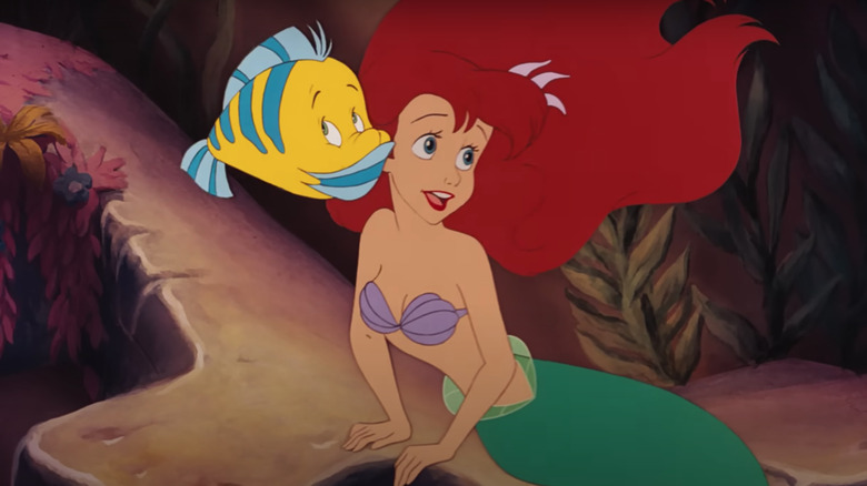 Flounder whispering in Ariel's ear