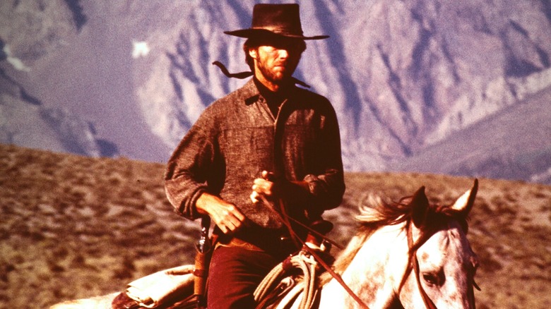 The Stranger riding his horse in "High Plains Drifter"