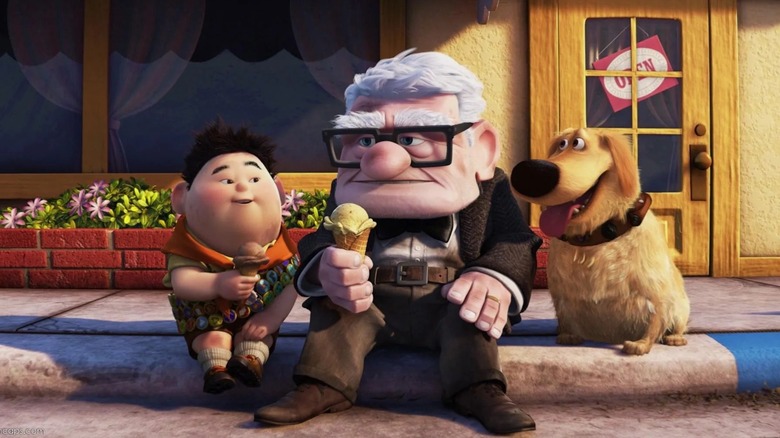Carl and Russell sitting on a curb in Up