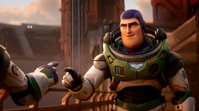Buzz Lightyear preparing to tap fingers with a comrade in Lightyear
