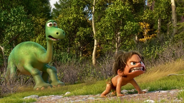 Spot protecting Arlo in The Good Dinosaur