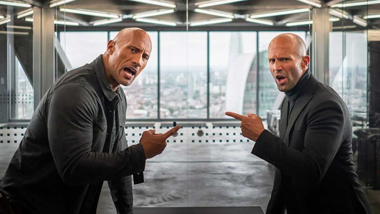 Hobbs & Shaw pointing at each other