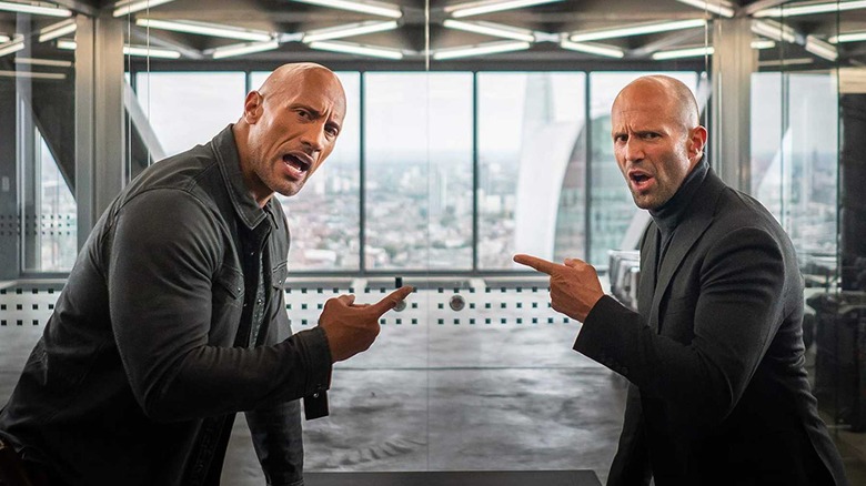 Hobbs & Shaw pointing at each other