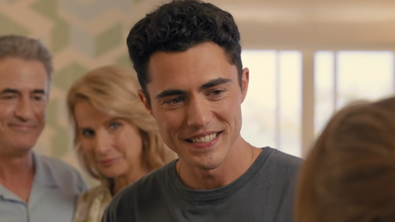 Darren Barnet as Jonathan smiling in Anyone but You
