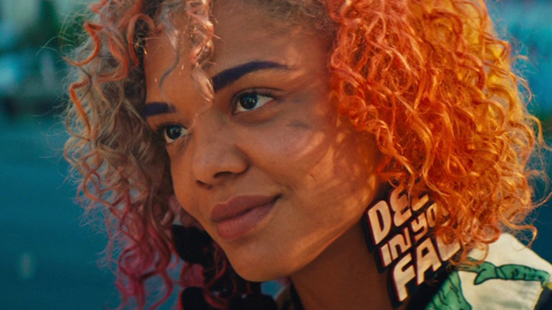 Tessa Thompson as Detroit smirking