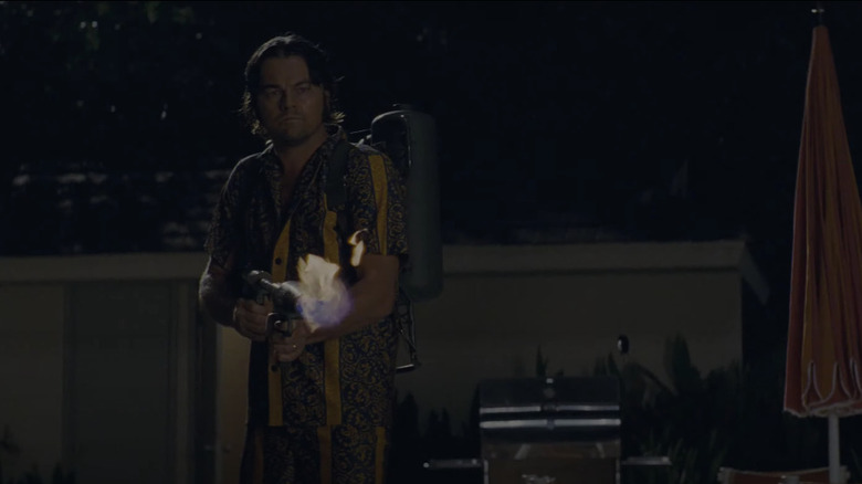 Rick Dalton takes aim with a flamethrower