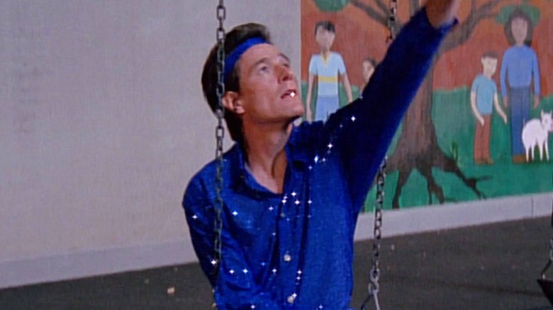 Hal looking up in skating clothes