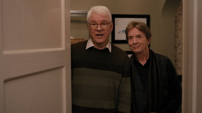 Charles and Oliver opening door