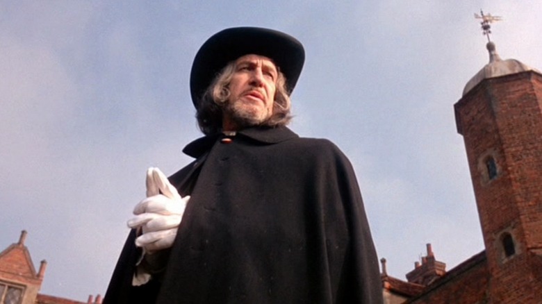 Matthew Hopkins standing outside by church