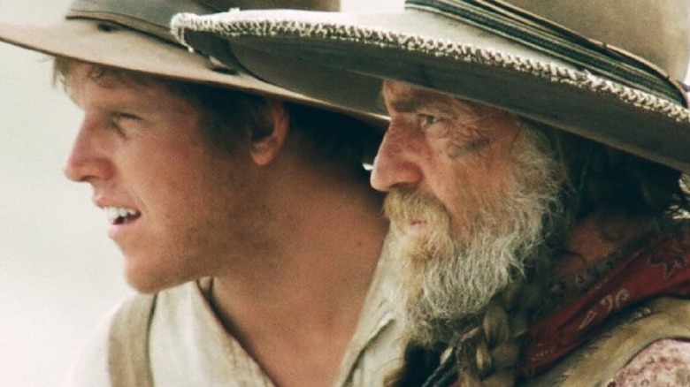 Karl and Barbarosa stare into the distance in 