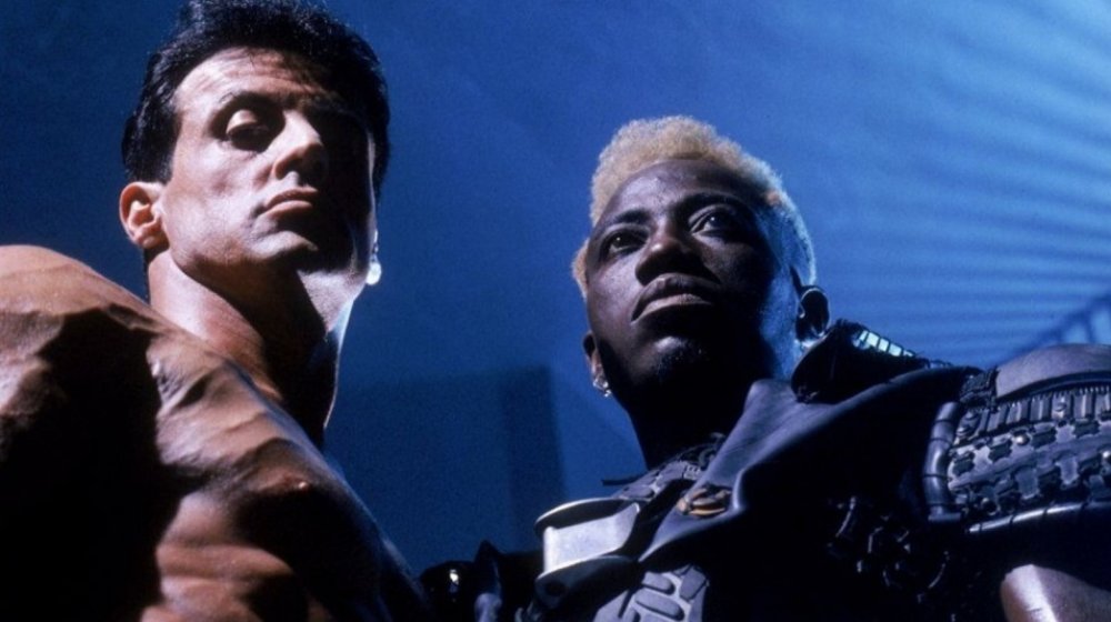 Sylvester Stallone as John Spartan and Wesley Snipes as Simon Phoenix in Demolition Man