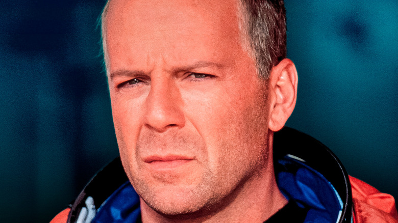 Harry S. Stamper in Armageddon against a blue backdrop