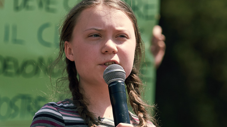 Greta Thunberg speaking onstage
