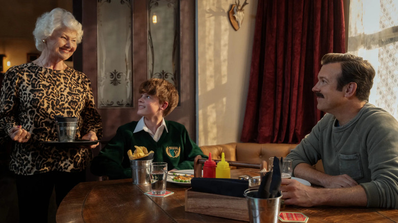 Ted and Henry having a meal at a restaurant in "Ted Lasso" (2020-present)