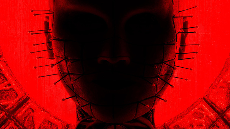 Pinhead illuminated by red light