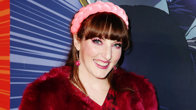 Caitlin Glass smiling at premiere