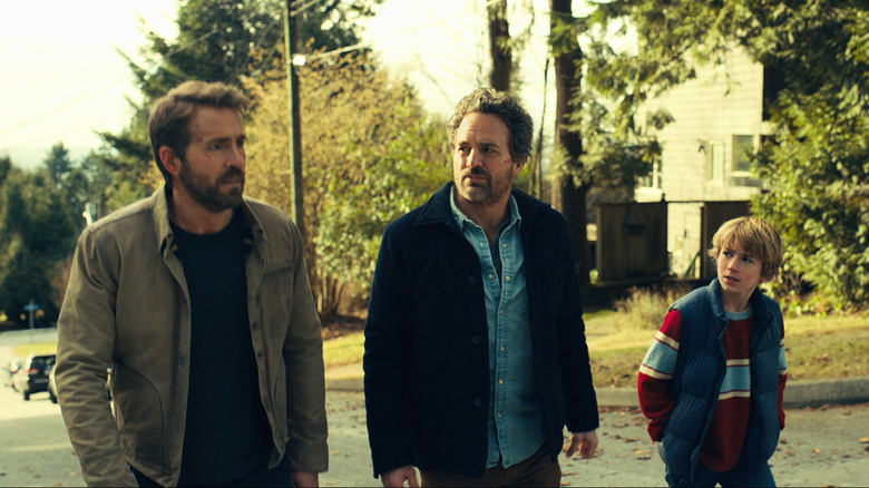 The Adams talking to their father