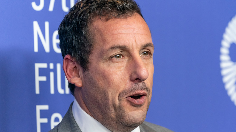 Adam Sandler laughing