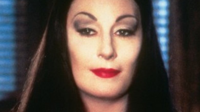 Anjelica Huston as Morticia Addams