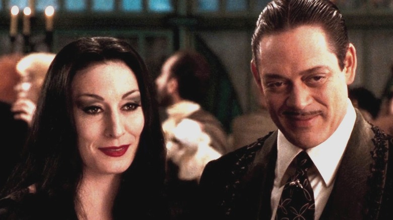 Morticia and Gomez at a social function