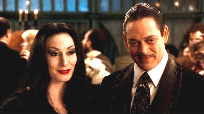 Morticia and Gomez at a social function
