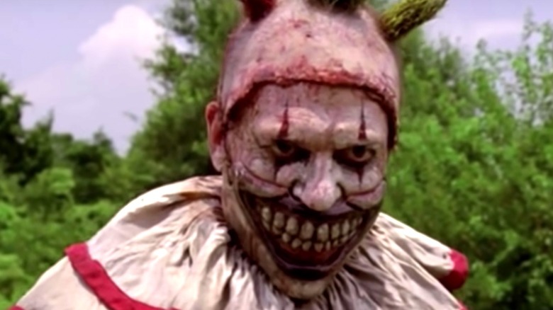 Twisty the Clown smiling in AHS