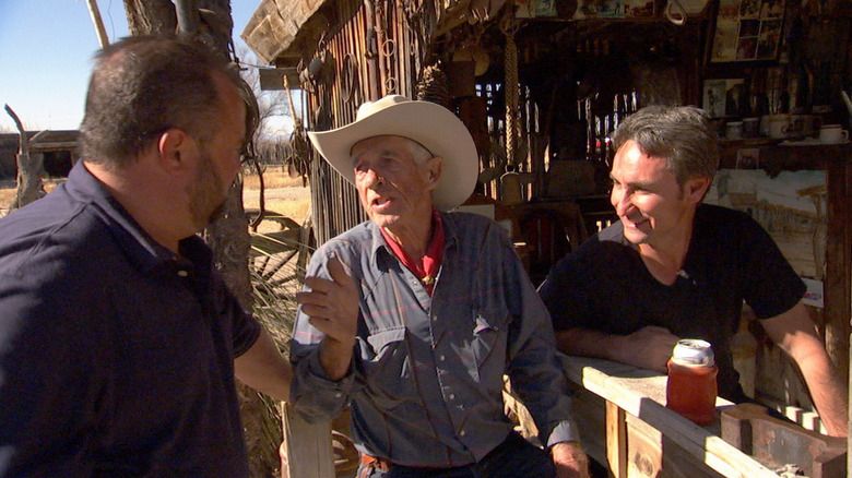 Mike and Frank talk to seller on ranch