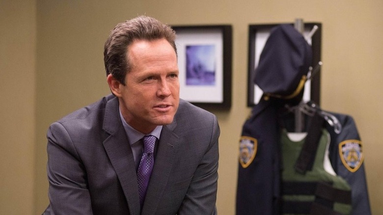Detective Keith Pembroke leaning in on Brooklyn Nine-Nine.