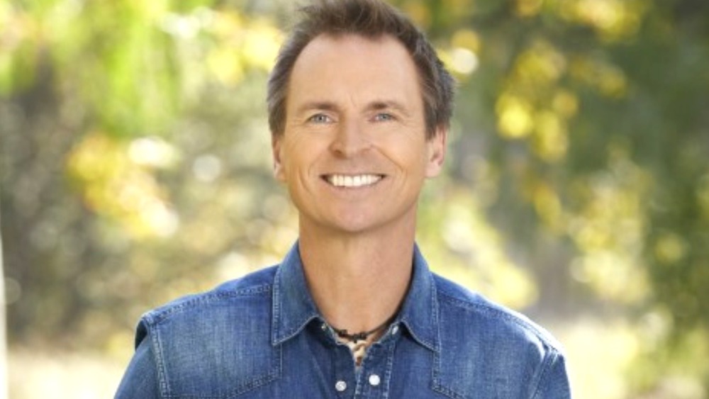 Phil Keoghan smiles on The Amazing Race