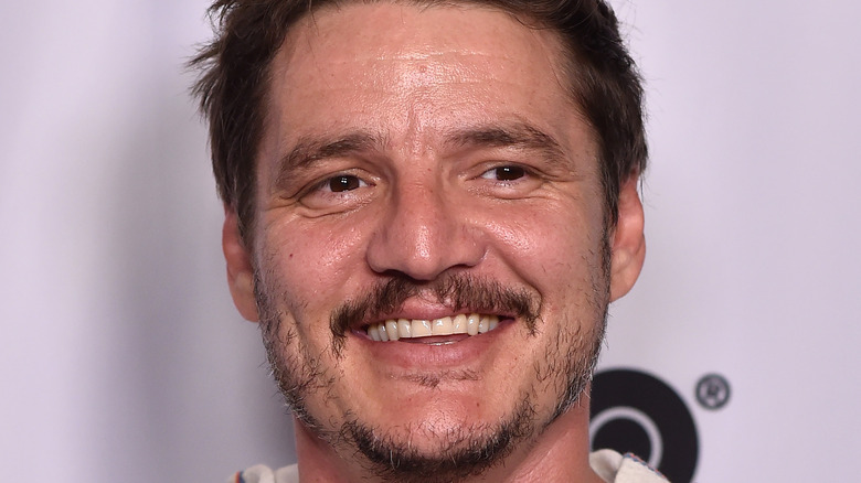 Pedro Pascal smile HBO logo