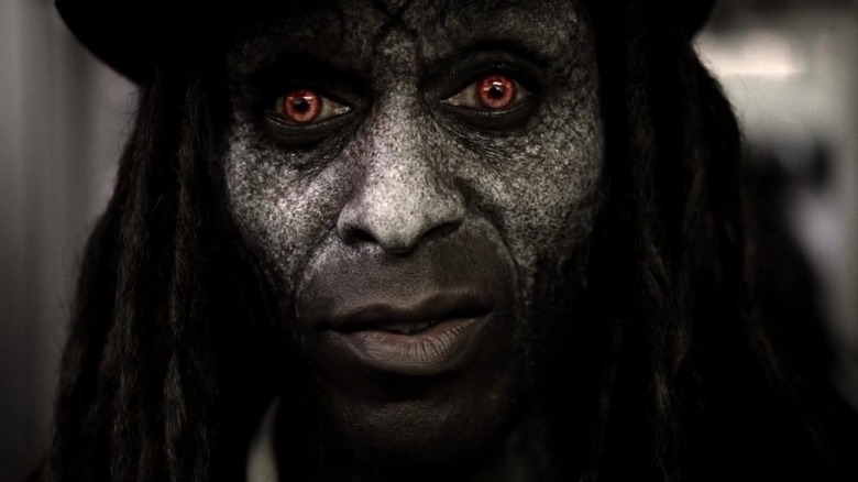 Papa Legba smiling in AHS