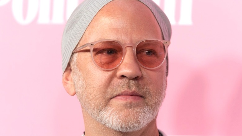 Ryan Murphy rocking sunglasses and a beanie 