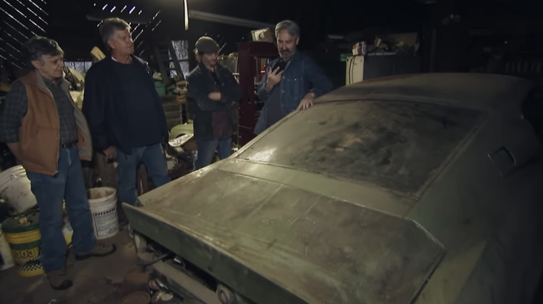 The American Pickers surrounding Kevin's car