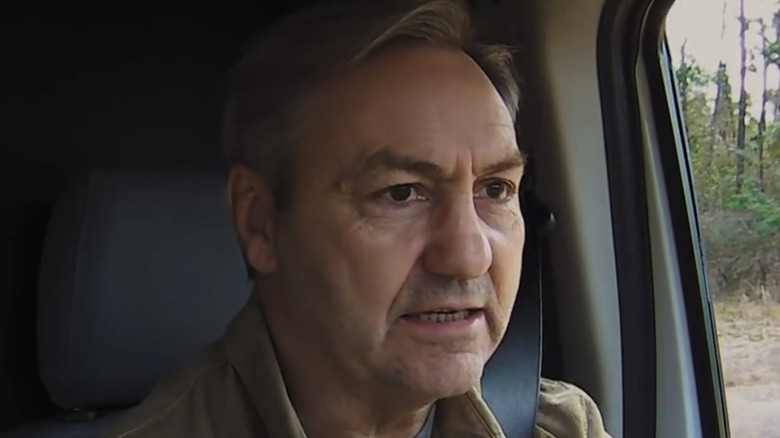 Robbie Wolfe driving a van