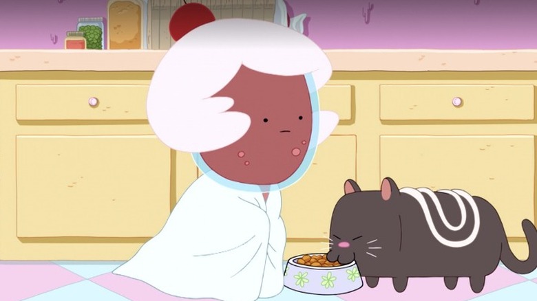Cherry Cream Soda feeding the cat