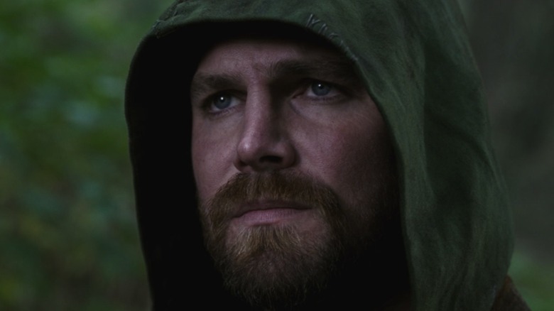 Oliver Queen stalks the jungle in Arrow