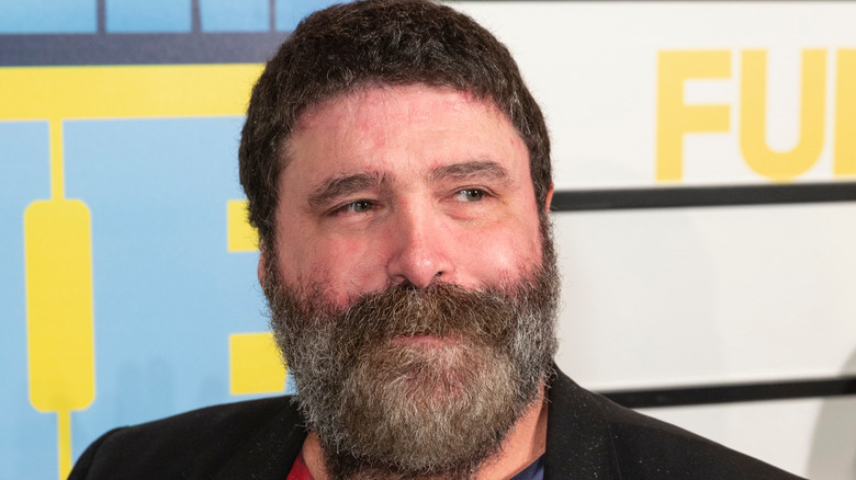 Mick Foley smiling under his beard