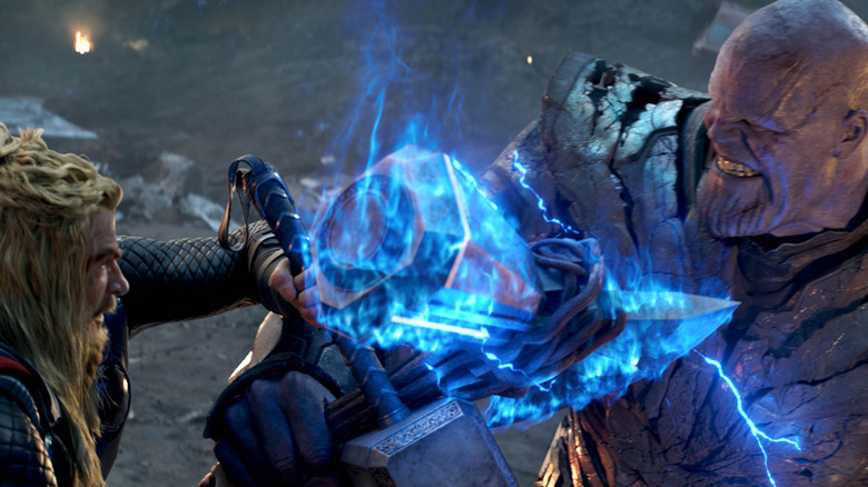 Thor fighting Thanos over Mjolnir in "Avengers: Endgame" (2019)