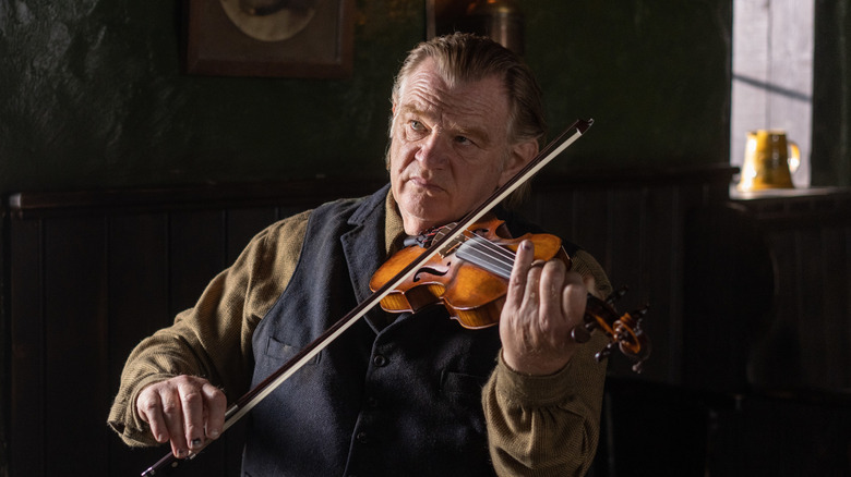 Brendan Gleeson playing fiddle