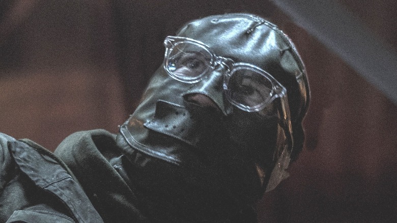 The Riddler wearing his suit