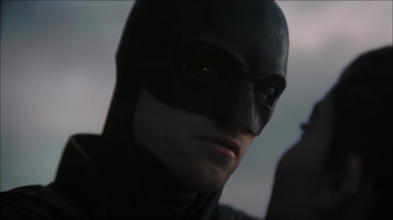 Batman looking at Catwoman