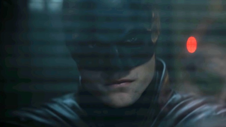 Batman behind glass window