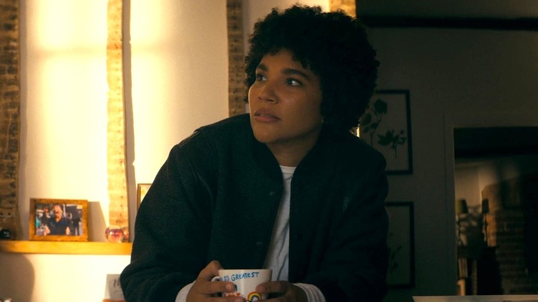 Verona Parker holding a mug in "The Beekeeper" (2024)