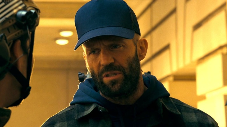 Adam Clay wearing a hat in "The Beekeeper" (2024)