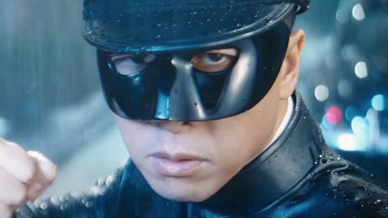 Donnie Yen wearing a mask and black coat