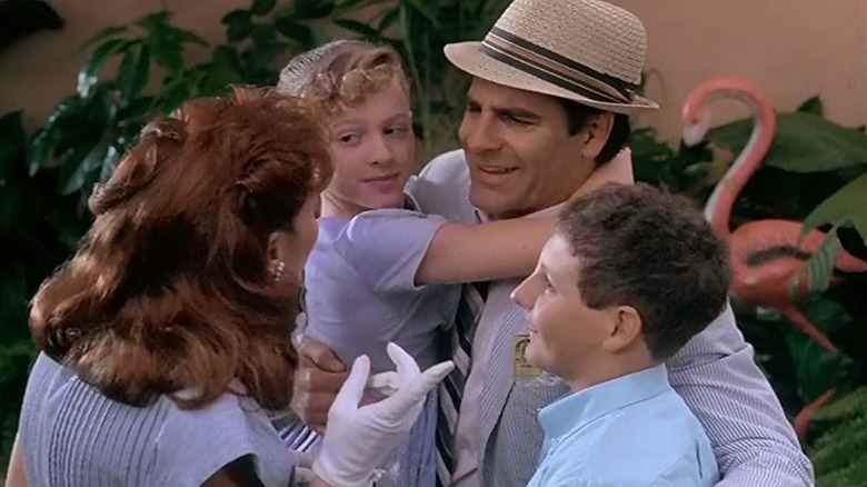 Sam/Marty greets his family