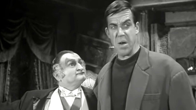 Human Herman Munster scowling
